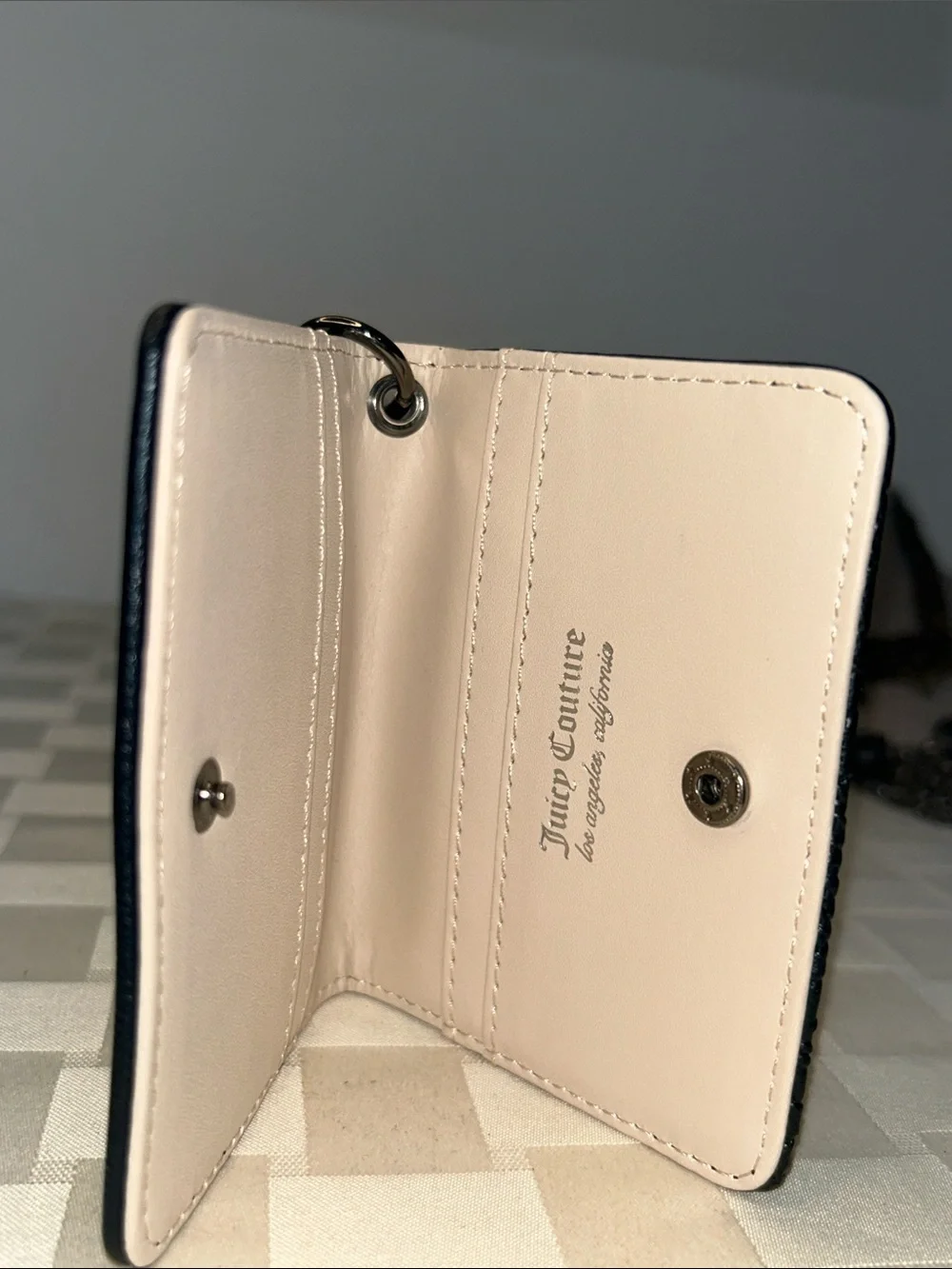 Juicy Couture compact embossed